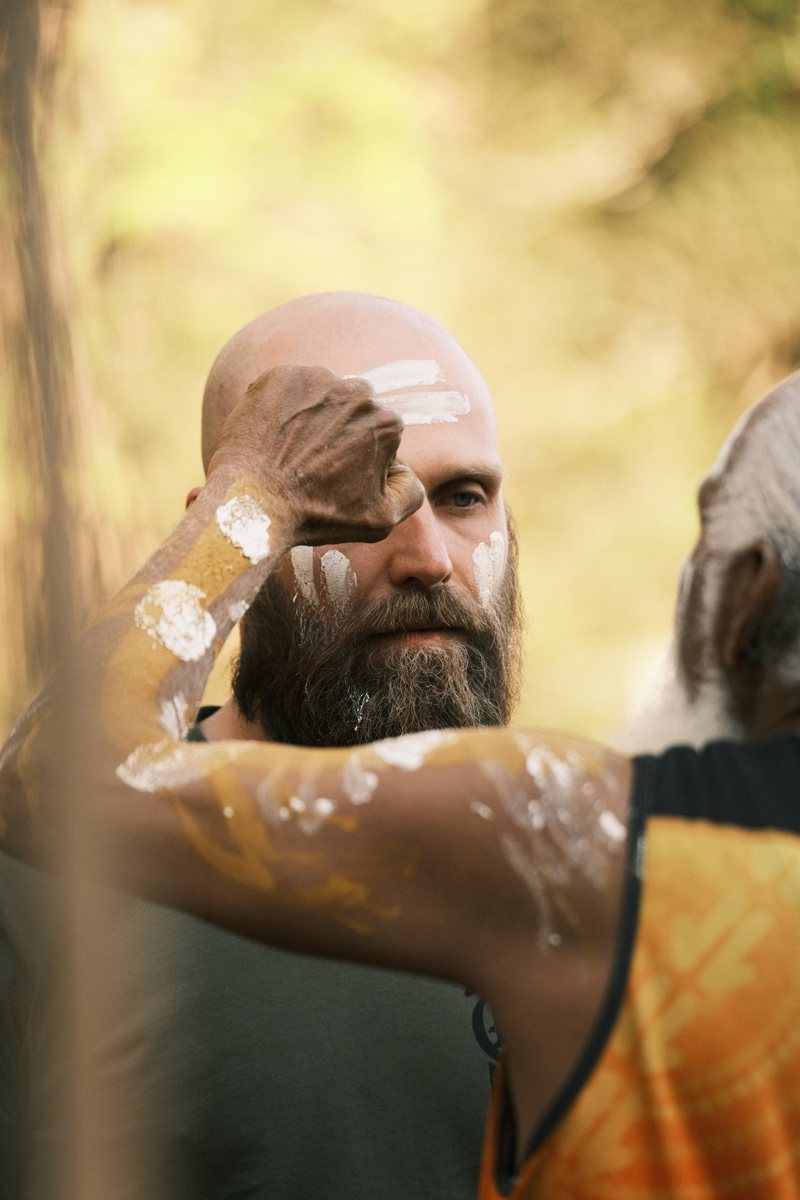 Jacob O'Neill being marked with white ochre during ceremony